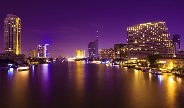 The light from the tallest building in the city and the river. Beautiful views of Bangkok Thailand.