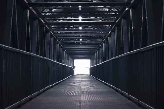 The steel bridge pavement in a straight line.