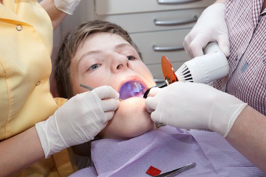 dental treatment with dental curing light
