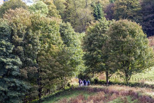 People out hill walking in Stirlingshire, Scotland, UK