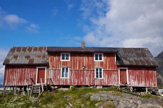 Old deteriorated fishing house on in Henningsvaer Lofoten islands in Norway