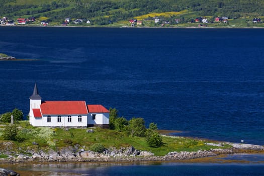 Picturesque church in fjord on Lofoten islands in Norway