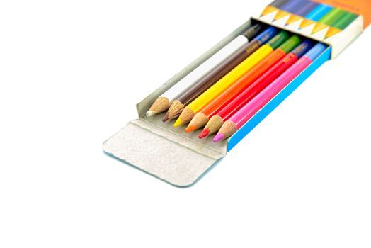 use old pencil color in box on white background isolated