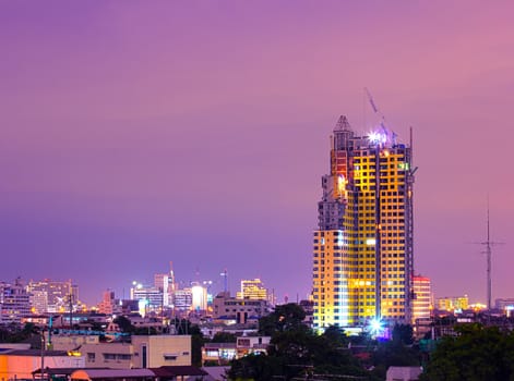 Tower cranes are used in construction work. Economic development in the city.