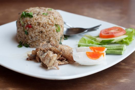 spicy fried rice with fried fish with salted egg