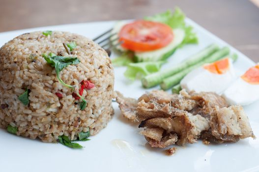 spicy fried rice with fried fish with salted egg