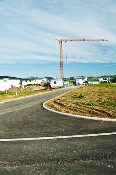 houses estate with crane