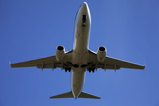 Airplane in the blue sky 