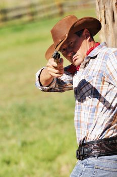 OUT WEST - A cowboy takes time to rest and reflect. 