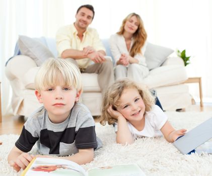 Childrens reading books in the living rooms