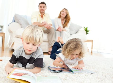 Childrens reading books in the living rooms