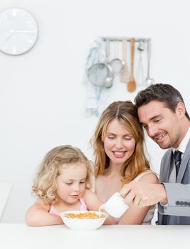 Family having breakfast together at home