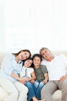 Portrait of a smiling family at home