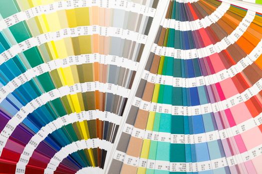 Fanned colour guide displaying a range of hues for all the spectral colours for use in interior design and decoration