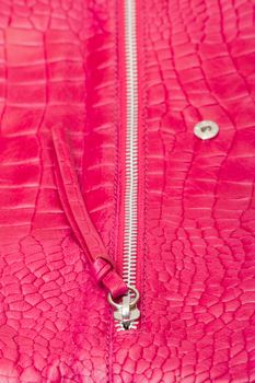 Textured pink leather with zipper used for fashion accessories