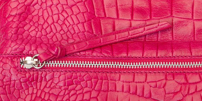 Textured pink leather with zipper used for fashion accessories