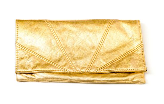 Luxury gold leather clutch bag in a simple classical design for evening use on a white background
