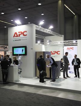 MILAN, ITALY - OCTOBER 17: People visit technologies products exhibition area at SMAU, international fair of business intelligence and information technology October 17, 2012 in Milan, Italy.