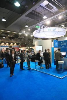 MILAN, ITALY - OCTOBER 17: People visit Intel technologies products exhibition area at SMAU, international fair of business intelligence and information technology October 17, 2012 in Milan, Italy.