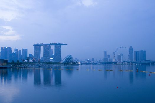 Singapore business district skyline in the evening