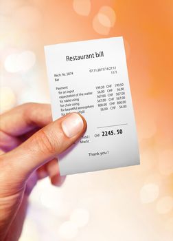 Restaurant bill for a large sum of money on hand