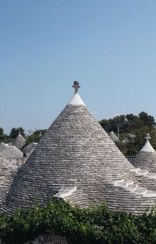 Roof of a trullo, a traditional apulian dry stone hut, typical a specific part of the south of Italy
