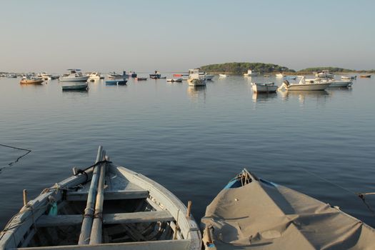 Docked fishing boats in a small village in the south of Italy
