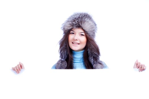 winter woman in fur cap hold banner isolated