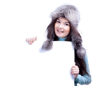 smiling woman hold banner in fur cap hold banner isolated