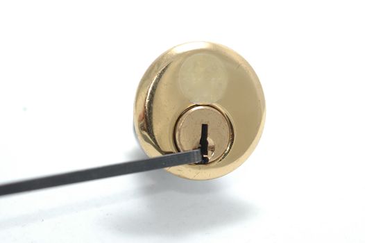 Picking a pin-tumbler lock with a tension wrench