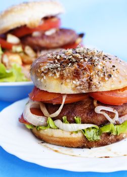 Burger with meat and baked vegetables