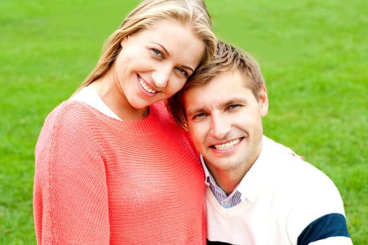 Close up shot of gorgeous young love couple outdoors in the park