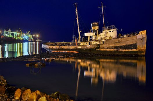 An old abandoned boat at night in Ushuaia, Argentina.