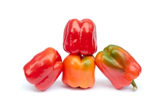 Group of sweet pepper fruits on a white background