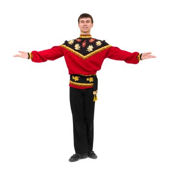 young man wearing a folk russian costume posing against isolated white background