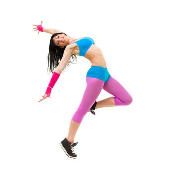 Smiling dancer posing against isolated white background