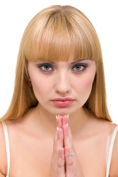 young woman praying, isolated on white background
