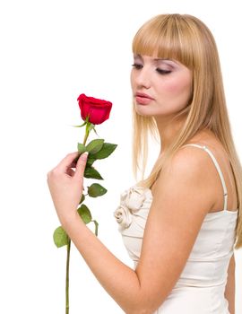 Young woman with rose against isolated white background