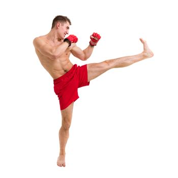 young fighter exercising against isolated white background