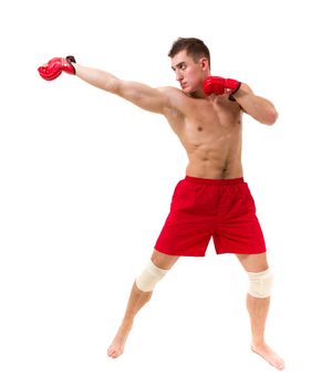 fighter exercising against isolated white background