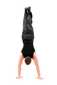 young gymnast posing on a white background