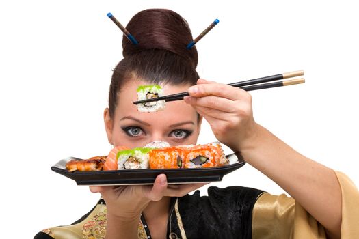 Close up portrait of young woman with sushi