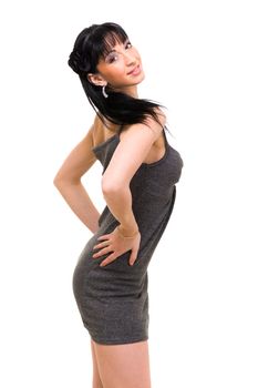 Smiling young woman waist-up portrait against isolated white background