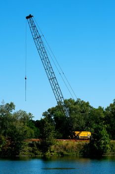 Crawler-mounted Latticework BoomCrane sits idle.