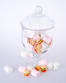 Candies. colorful candies in glass jar on the background