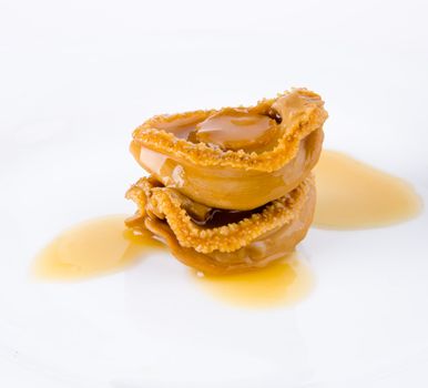 Abalones. Chinese cuisine abalone on the background.
