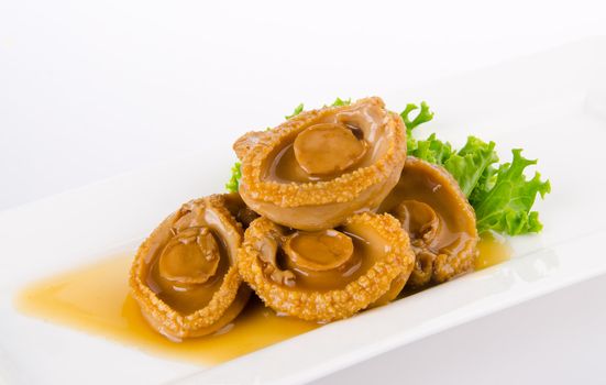 Abalones. Chinese cuisine abalone on the background.