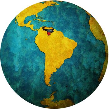 map with flag of venezuela on isolated over white map of globe