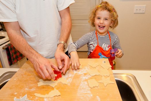 Making shortbread cookies together at home before Christmas.
