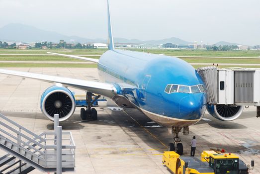 Plane in airport getting ready to fly